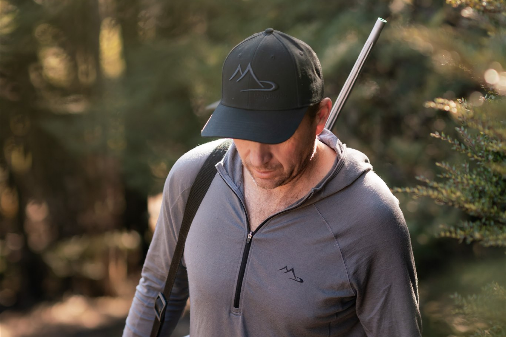 Main Divide Apparel Nuyarn pullover worn by hunter in NZ forest — lightweight, high-performance merino technology